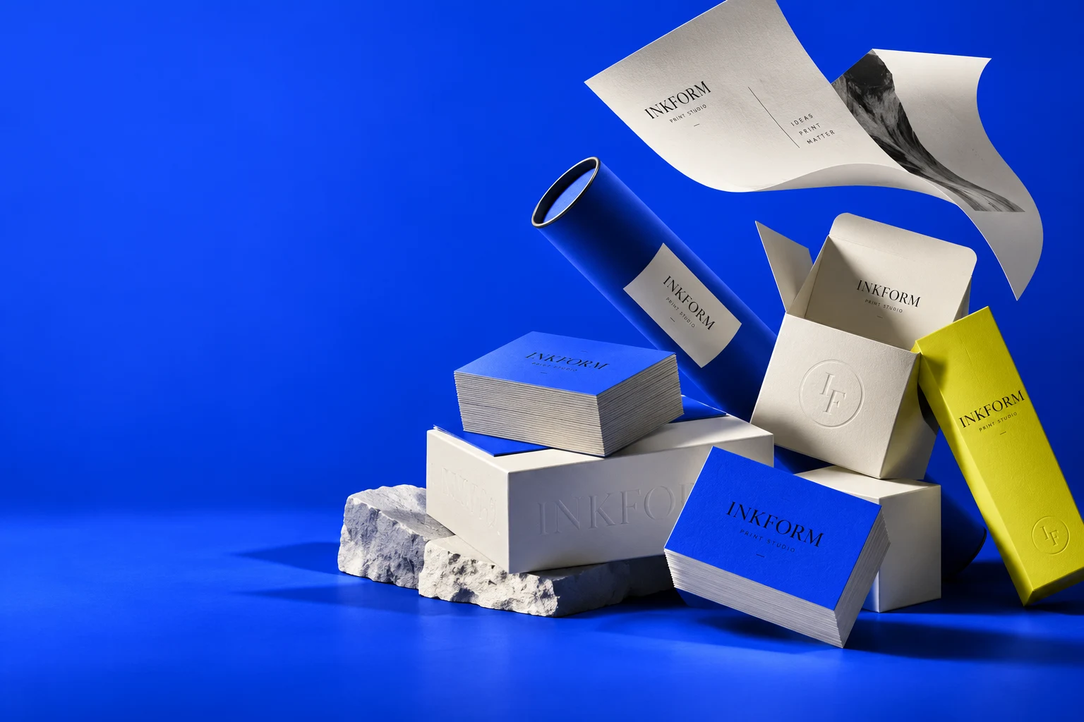 AI concept of INKFORM packaging, business cards and print in blue, ivory and yellow